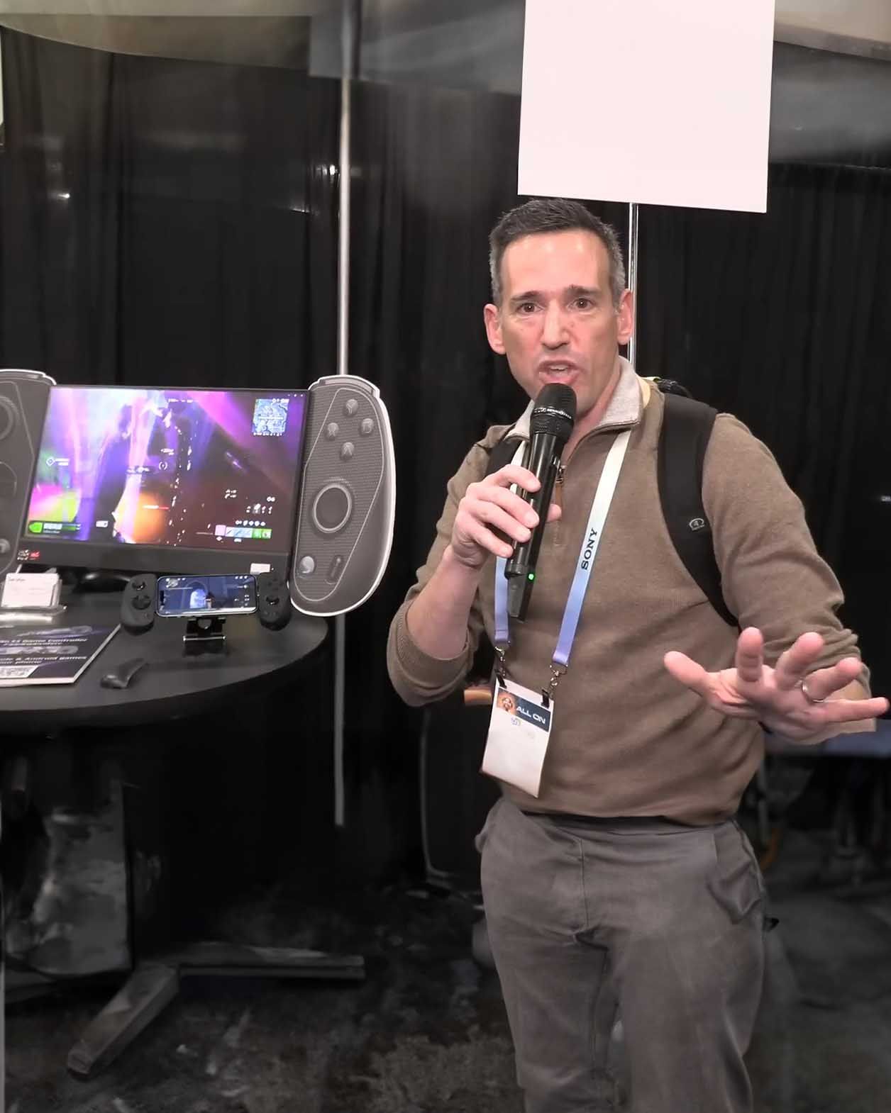The influencer Lon.TV reviews the Serafim S3 Mobile Gaming Controller with Genshin Impact at CES 2024