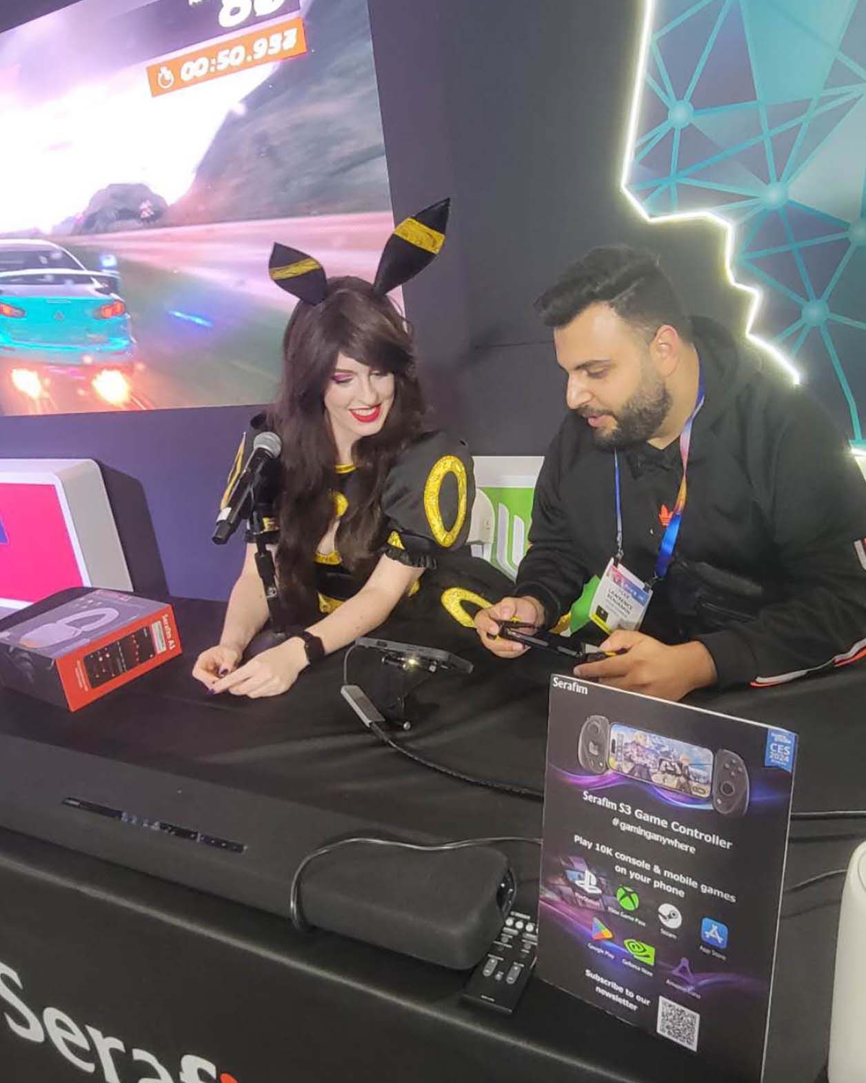 The male focuses on his race in Asphalt 9 with the Serafim S3 Cloud Gaming Controller.