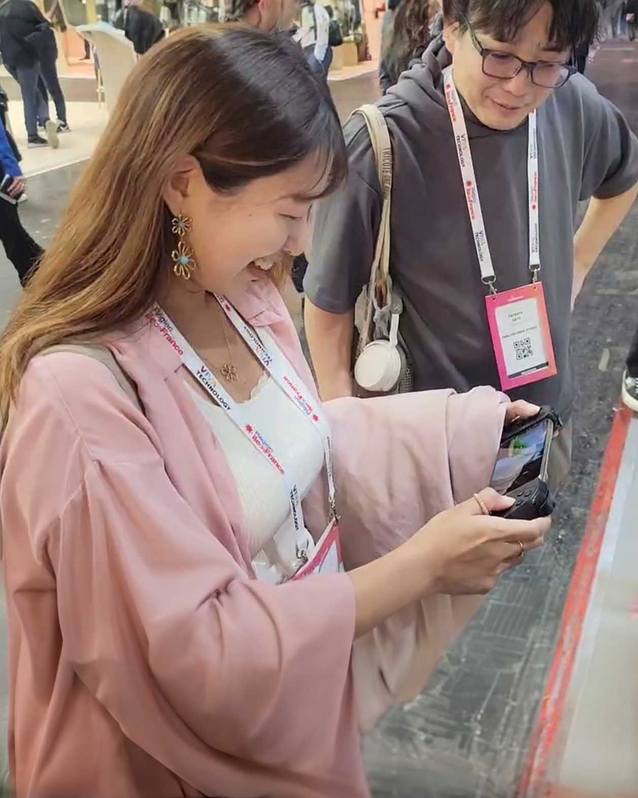 A female says the mobile gaming is so fun with the S3 Mobile Gaming Controller at VivaTech 2024
